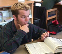 student_reflecting_upon_information_source