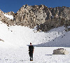 Chris with Iceberg Lake and Mt. Russell in the background