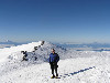 Chris on the summit of Rainier!  In the distance, Mt. Adams on the left, Mt. St. Helens on the right.