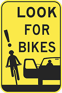 Look for bikes sign with car door opening into cyclist's path