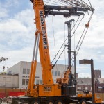 Close up of the crane carriage. The entire weight of the crane plus load is supported by and balanced by four outriggers.