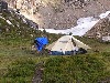 Andrew ambles out of the tent after a night's rest.